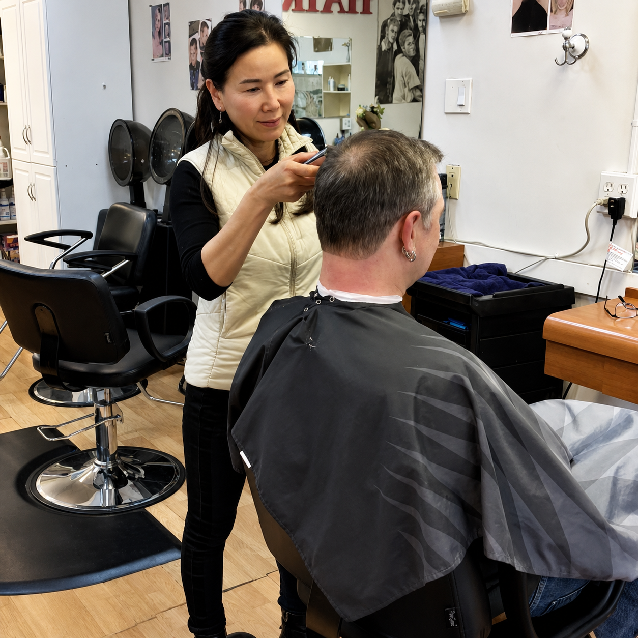 Hair 2000 stylist working with a long-time client